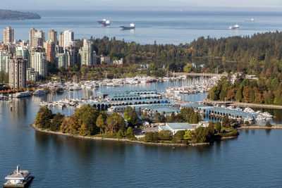 Downtown vancouver on a sunny day flying over via helijet helicopter