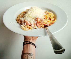 Close-up of hand holding food