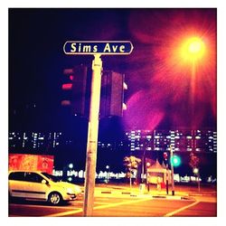 Street lights in illuminated city at night