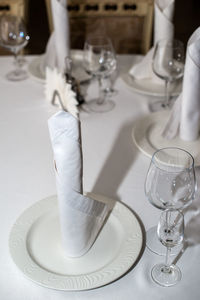 Close-up of wine glasses on table at restaurant