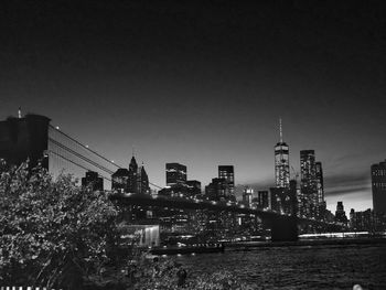 Buildings in city at night