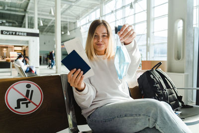 Portrait of woman using mobile phone