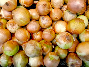 Full frame shot of onions for sale at market stall