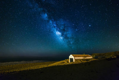 View of building on field at night