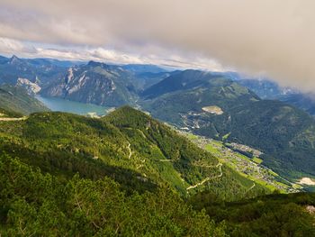 Scenic view of landscape and mountains against sky