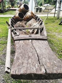 Old rusty wheel on field