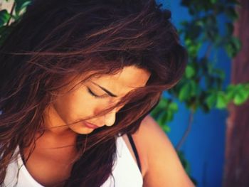 Close-up portrait of young woman