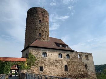 Low angle view of historic building against sky