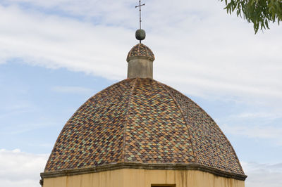 Low angle view of traditional building against sky