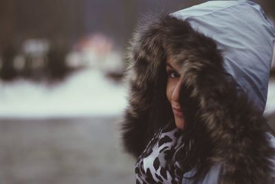 Portrait of young woman winter coat