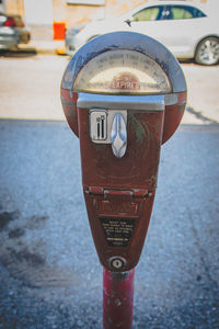 Close-up of coin-operated binoculars against blurred background