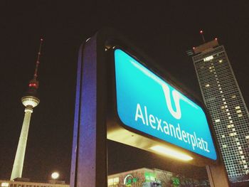 Low angle view of illuminated building at night