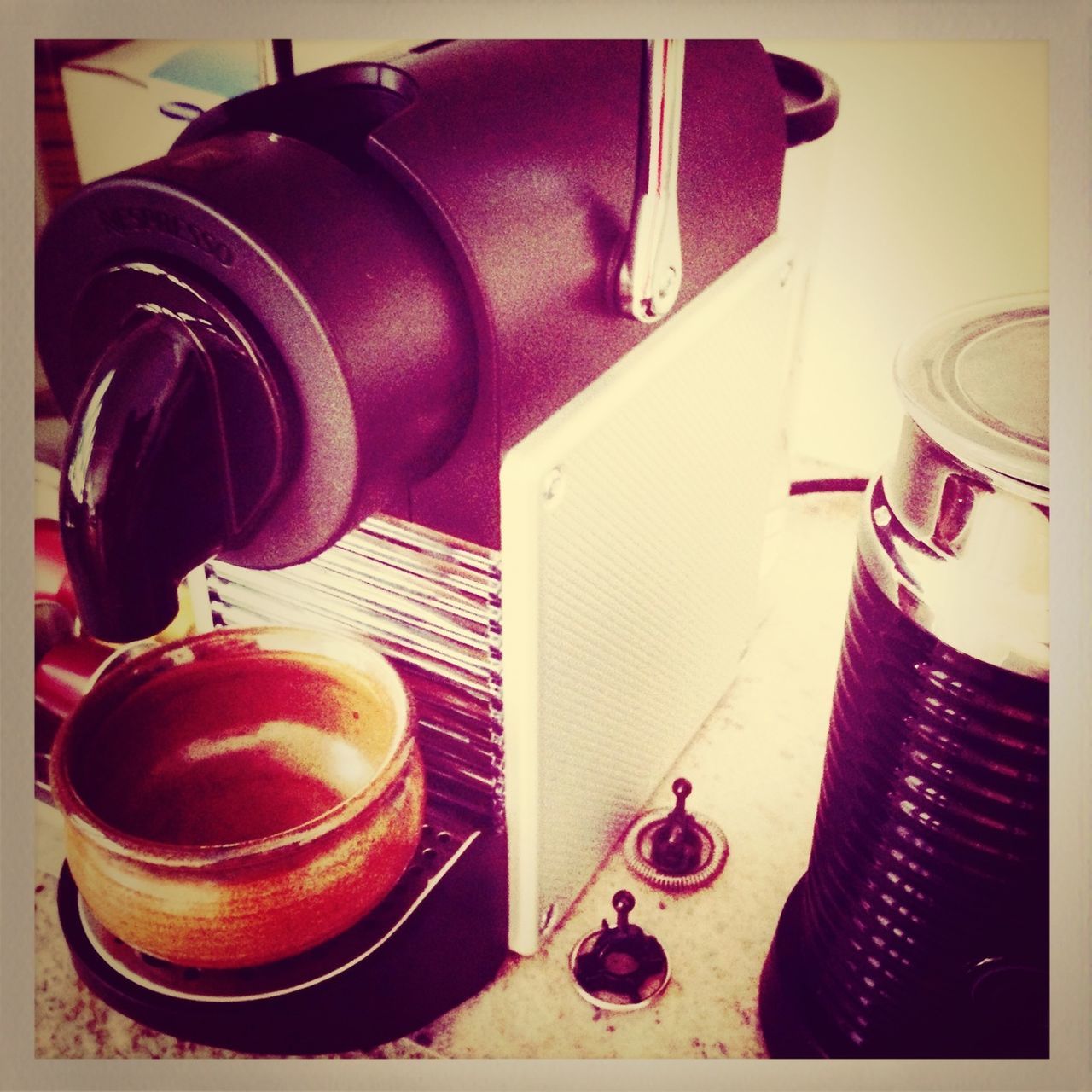 transfer print, indoors, auto post production filter, still life, table, high angle view, no people, chair, absence, home interior, close-up, technology, day, red, container, equipment, plastic, stationary, coffee cup, old-fashioned