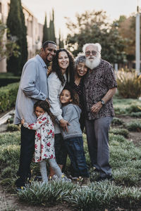 Traditional family portrait of multigenerational family standing