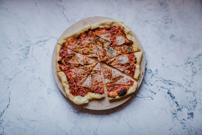 High angle view of pizza on table