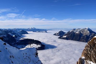 Scenic view of sea against sky during winter