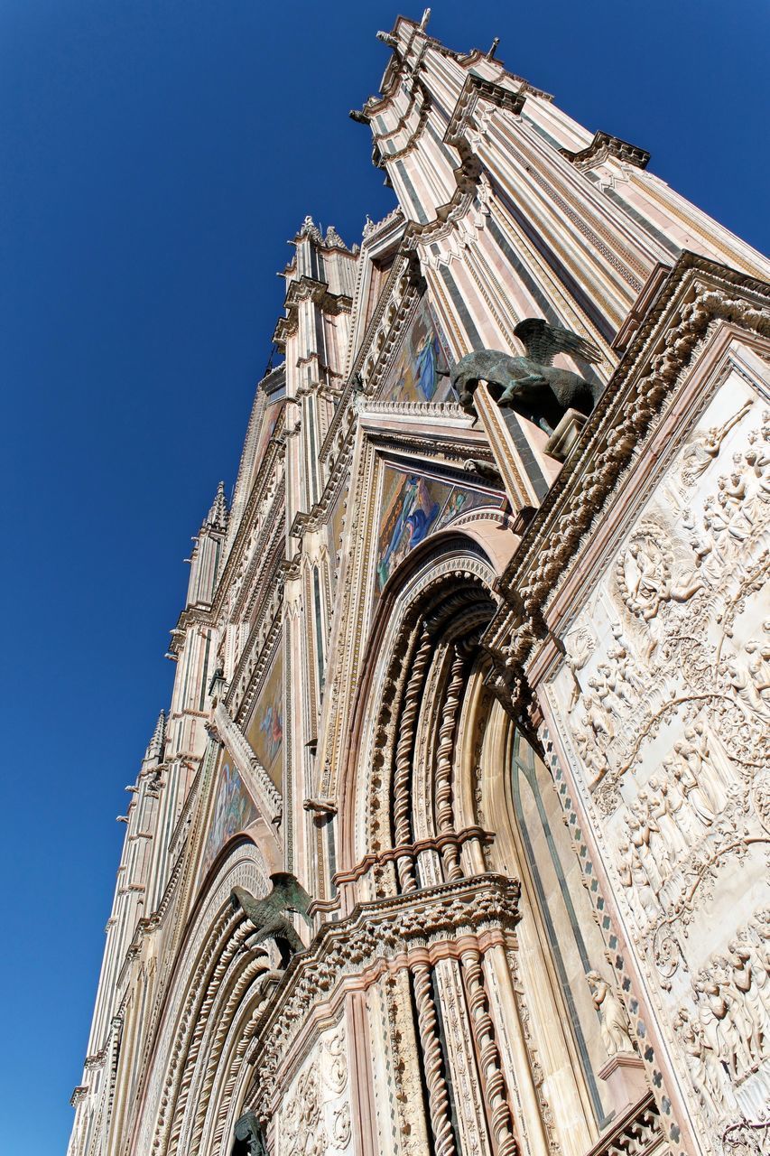 LOW ANGLE VIEW OF TEMPLE AGAINST CLEAR SKY