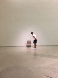 Man standing in an empty room