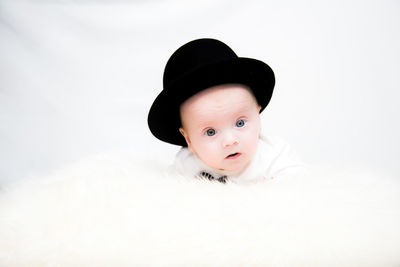 Portrait of baby wearing hat