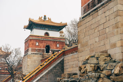 Low angle view of old building against sky