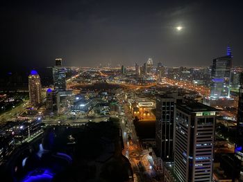 Nighttime in dubai - from marina over media city with dubai downtown in the horisont.