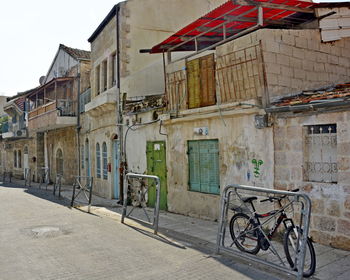 Bicycle parked outside building