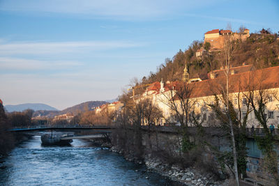 Bridge over river against sky