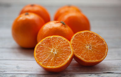 Close-up of oranges on table