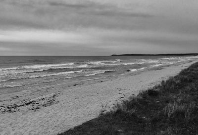 Scenic view of beach against sky