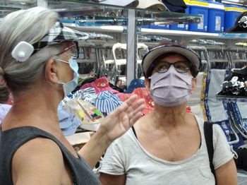 Portrait of woman holding camera