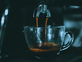 Close-up of coffee cup on table