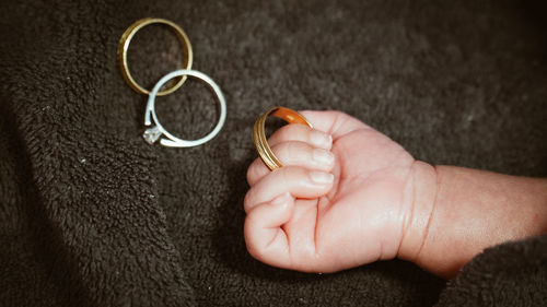 Close-up of woman holding hands