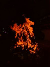 View of bonfire at night