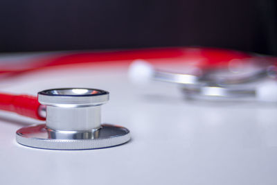 Close-up of drinking glasses on table