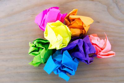 High angle view of multi colored umbrellas on table