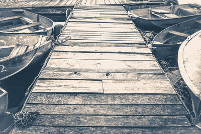 High angle view of empty staircase by water