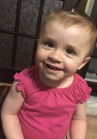 Portrait of cute baby boy at home