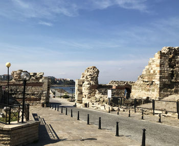 View of old ruin building against cloudy sky