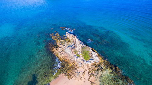 High angle view of rocks on beach