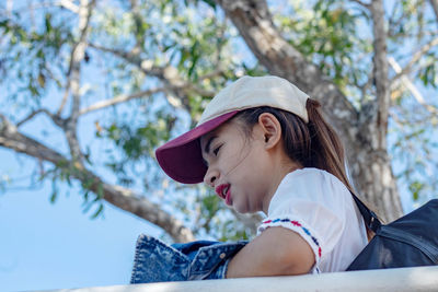 Low angle view of young woman