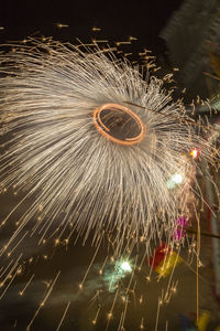 Close-up of illuminated fireworks at night