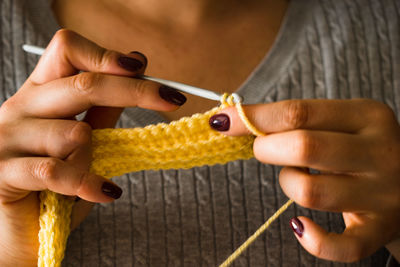 Close-up of woman hand holding ice cream