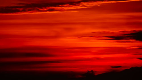 Low angle view of dramatic sky during sunset