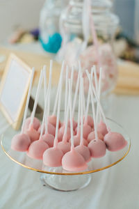 Close-up of multi colored candies on table