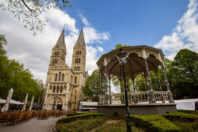 Low angle view of cathedral against cloudy sky