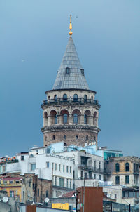 Tower of building against blue sky