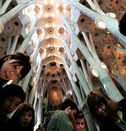 Low angle view of people standing in museum