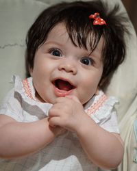 Portrait of cute baby at home