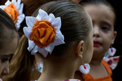 Girl wearing hair accessory by friends