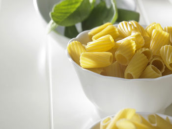 Close-up of pasta in bowls on table